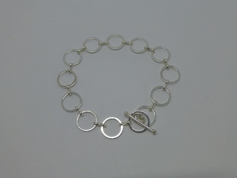 Member strap Round Silver