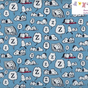 10 EUR/qm Baumwollstoff Snoopy Schlaf Kissen auf blau hellblau Bild 1