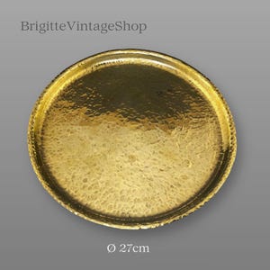 Brass plate tray round shape handmade by hammering technique vintage jewelry tray collector gift brass wedding more to the article...