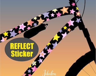 May include: Black silhouette of a bicycle with a colorful star pattern on the frame. The text "REFLECT Sticker" is on a gray oval. The text "Jabalou" is in cursive at the bottom of the image.