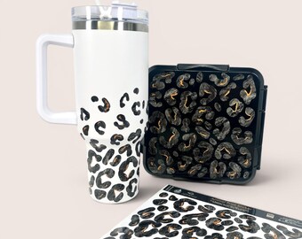 Dishwasher-safe animal print stickers in black and orange for lunchboxes or water bottles