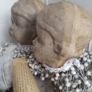 Antique papier-mâché doll's head, circa 1940