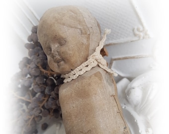 Old doll's torso made of papier-mâché around 1940