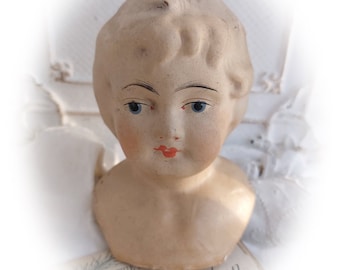 Tête de poupée ancienne en papier mâché vers 1930