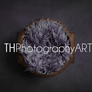 May include: A wooden bowl filled with a purple and white fluffy material. The bowl has two handles on the sides. The text "THPhotographyART" is written in white on a dark gray background.