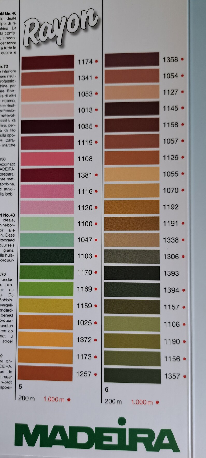 May include: A color chart for rayon thread with a variety of colors, including brown, orange, green, and black. The chart is labeled "Rayon" and includes numbers for each color. The chart is labeled "Madeira" at the bottom.