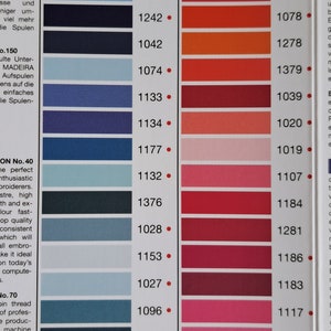 May include: A color chart for Madeira Rayon embroidery thread. The chart shows 20 different colors of thread, with the color number and length of each spool listed. The colors range from black to red to pink to blue.