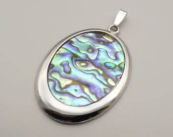 Paua pendant with metal setting - Paua shell pendant with metal setting