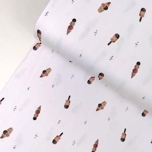 May include: White fabric with a repeating pattern of brown, pink, and white ice cream cones. The background is white with small black dots.
