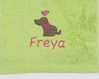 Towel and/or washcloth with name and dog with bird wish size wish color