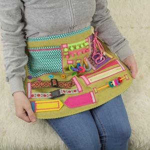 Schürze: Sensorische Stimulation bei Demenz, ADHS & Demenz-Kranke