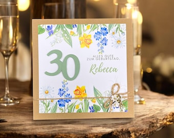 May include: A brown card with a white background and a floral design. The number 30 is in green and the text "Alles Gute zum Geburtstag, Rebecca" is in green.