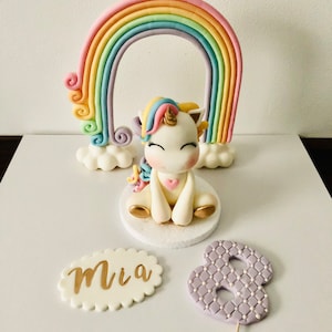 Fondant figures, cake decoration unicorn with rainbow