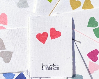 Wedding card handmade with colored hearts