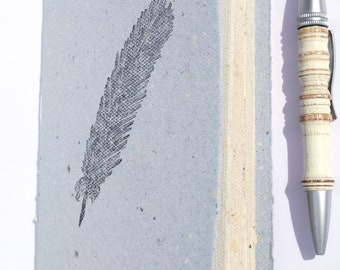 Handmade notebook with quill