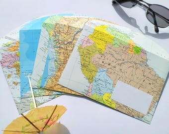 5 envelopes made of maps
