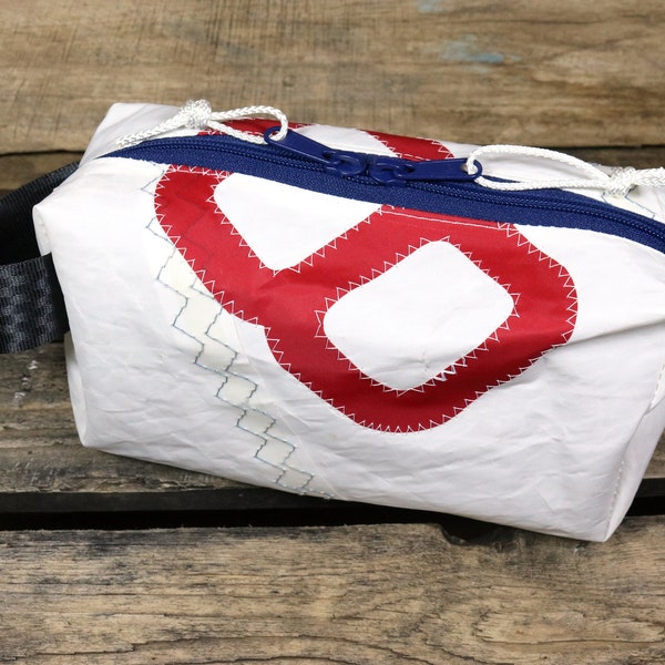 Toiletry bag with inner compartment made of sail