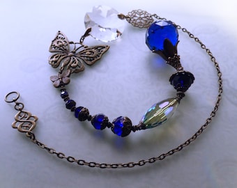 Large suncatcher deep blue with rainbow crystal and bronze butterflies SF-AB-7