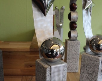 Sculpture stainless steel heart meets stainless steel ball