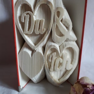 Book folding art You&Me 3 hearts and a large And with or without date 3D