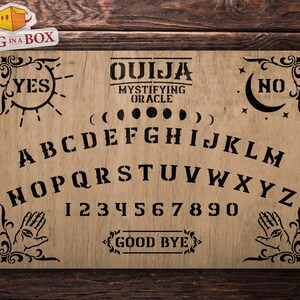 May include: A wooden Ouija board with black lettering and graphics. The board features the letters of the alphabet, numbers 1-9 and 0, the words "YES", "NO", and "GOOD BYE", and a crescent moon and sun graphic.