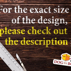 May include: A wooden background with a white and yellow text overlay that reads "For the exact size of the design, please check out the description ;)". A ruler and a scalpel are visible in the bottom left corner of the image. A logo for "DOG IN A BOX" is in the bottom right corner.