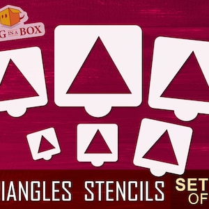 May include: Set of six white triangle stencils, with the words "Triangles Stencils Set of 6" printed below. The stencils are on a red wooden background.