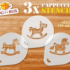 May include: Three white plastic stencils of rocking horses, each on a separate sheet. The stencils are for use with cappuccino or other beverages. The text "3x CAPPUCCINO STENCILS" is at the top of the image. The text "MYLAR 190 micron" is at the top right of the image.