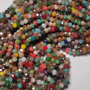 Glass beads, colorful mix, 1 strand, 135 pieces, 2.5 mm x 2.0 mm