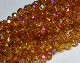 Glass beads, cut glass beads, rainbow plated, dark orange, 6 x 4.5 mm, 40 pieces