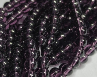 Glass beads purple 4 mm round