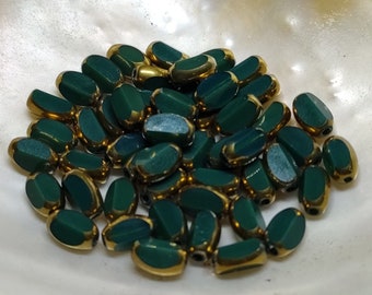 Glass beads plated gold edge oval 7x5x4mm