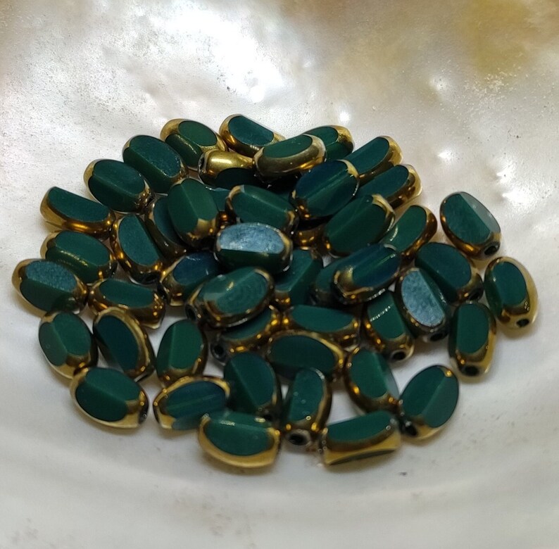 Glass beads plated gold edge oval 7x5x4mm image 1