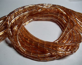 Glass beads orange tubes 5mmx2.5 mm apricot and plated