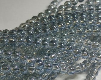 Glass beads blue-grey round 4 mm plated