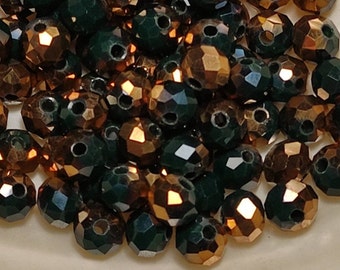 Glass beads, ground glass beads dark green half bronze plated 6 x 5 mm