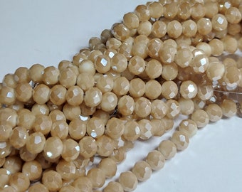 Glass beads faceted 6 x 5 mm rondelle sand-colored plated