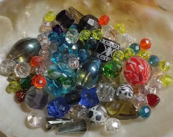 Glass beads, cut glass beads, mix of colours and shapes, 5 mm to 15 mm