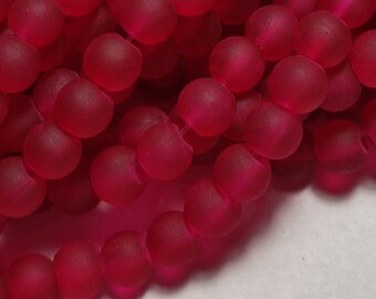 Glasperlen, medium violett rot, 6mm, mattiert