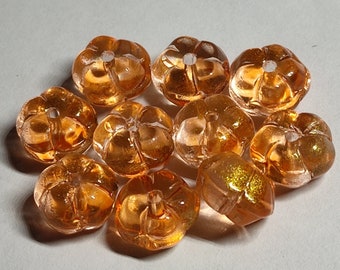 Glass beads orange flowers 9mmx7mm 10 pieces