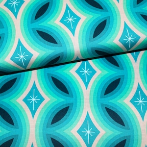 Könnte beinhalten: Tealfarbener und weißer geometrischer Stoff mit einem sich wiederholenden Muster aus geschwungenen Linien und Sternbursts.