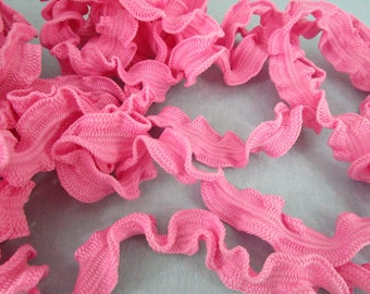 1.50 m narrow ruffled elastic band gathered in the middle pink (2 cm wide) 133-9-20