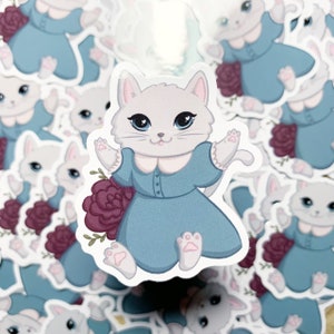 Aiutami a donare! (leggi la descrizione) - Gattino con un adesivo in vinile vestito