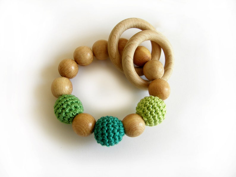 Green baby rattle