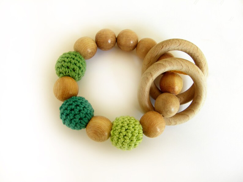 Green baby rattle