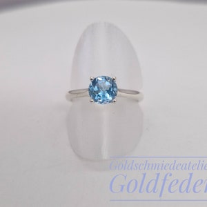 Solitaire Topaz Ring