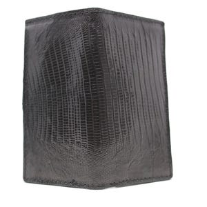 May include: A black vertical card holder featuring a textured surface with a distinct lizard skin pattern. The rectangular accessory has clean, stitched edges and a slim profile, designed to hold cards securely in a compact, upright orientation.
