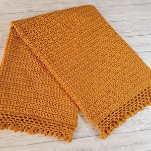 Patroon gehaakte babydeken met sterren en pompons (pdf)