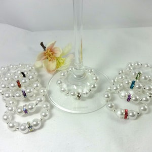 10 SET STARDUST PERLEN SEKTGLAS ANHÄNGER GLASMARKIERER PARTY DEKO BUNT RING 10 SET STARDUST PERLEN SEKTGLAS ANHÄNGER GLASMARKIERER PARTY DEKO BUNT RING