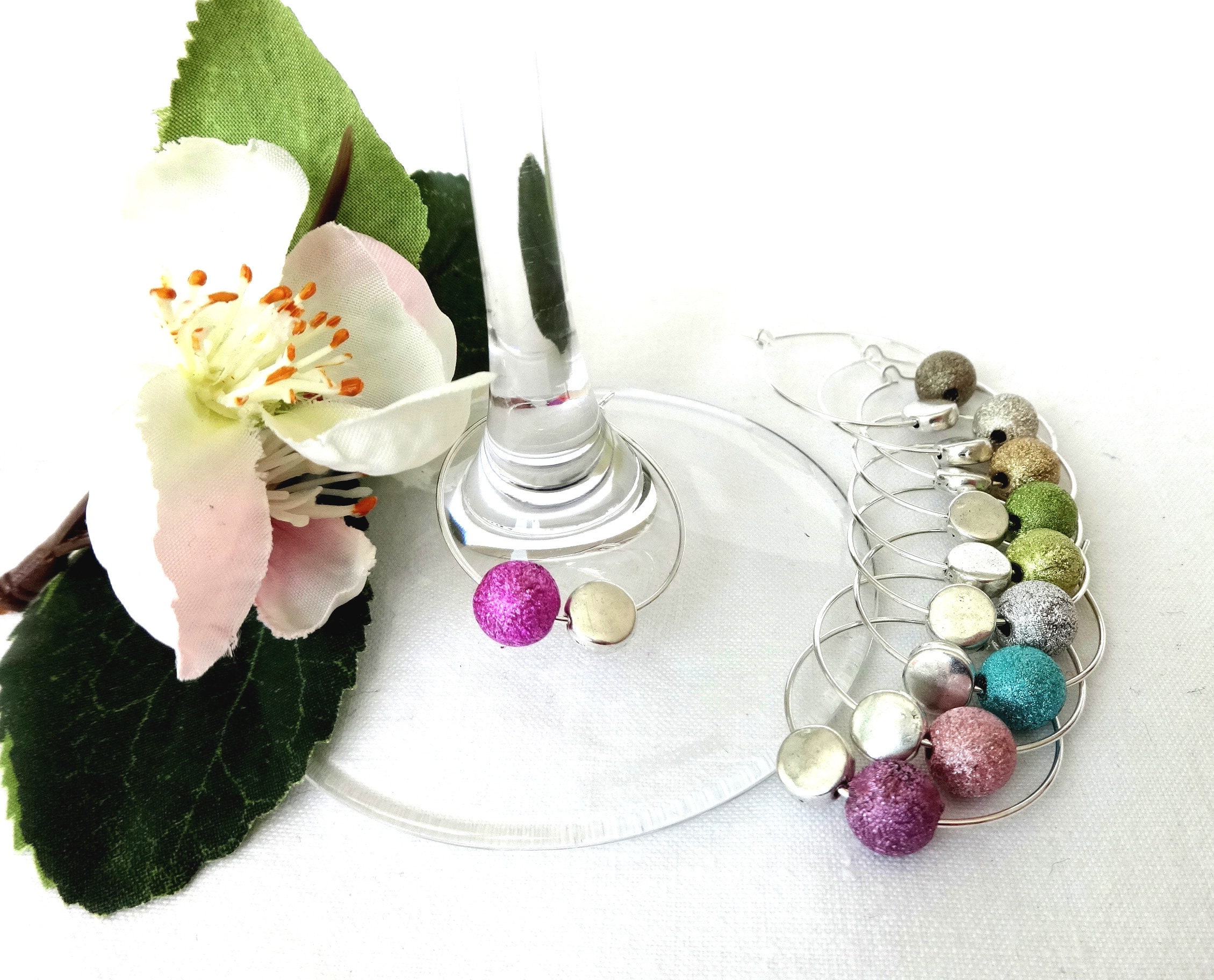 10 SET STARDUST PERLEN SEKTGLAS ANHÄNGER GLASMARKIERER PARTY DEKO BUNT RING 10 SET STARDUST PERLEN SEKTGLAS ANHÄNGER GLASMARKIERER PARTY DEKO BUNT RING